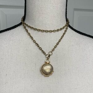 Vintage 1928 Jewelry Company 4 way locket; Gold tone metal